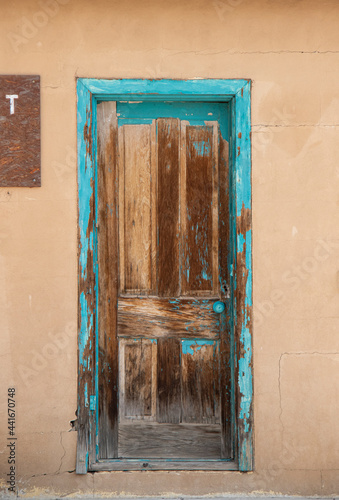 Old door with turquoise color