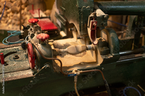 Lathe machine to make Dutch handmade wooden clogs, typical shoes.