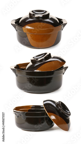 Black casserole dish or crock pot  isolated on white.