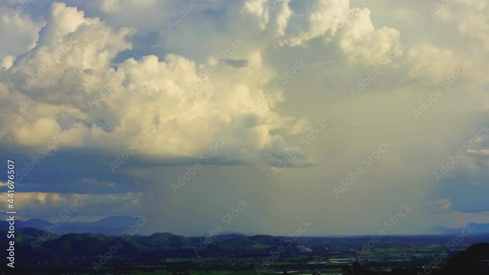 Time lapse video 4K, Beautiful moving clouds with rain over the mountains Time lapse video 4K, Beautiful moving clouds with rain over the mountains