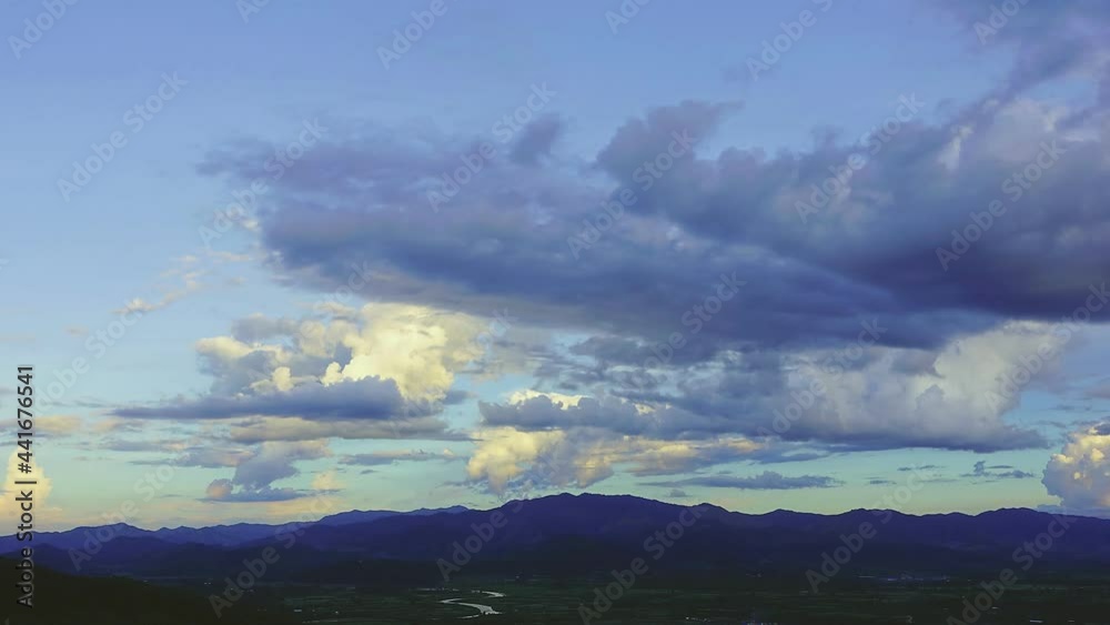 4K Time lapse, Beautiful clouds moving in sky above the mountains. 4K Time lapse, Beautiful clouds moving in sky above the mountains.