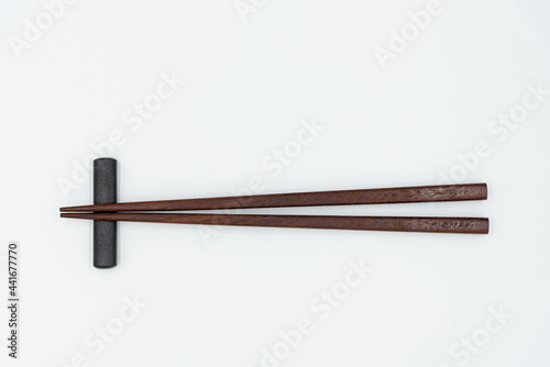 Isolated wooden chopsticks on white background