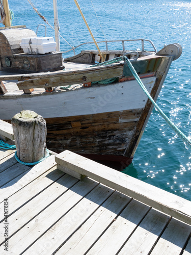 The bow of a wooden fishing boat in  Honningsvåg, Norway. photo