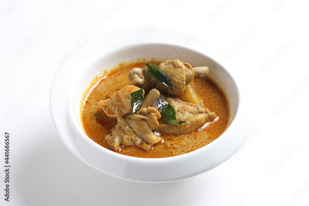 peranakan nonya spicy curry chicken cutlet and potato in white bowl with french toast bread in basket asian halal menu peranakan nonya spicy curry chicken cutlet and potato in white bowl with french toast bread in basket asian halal menu