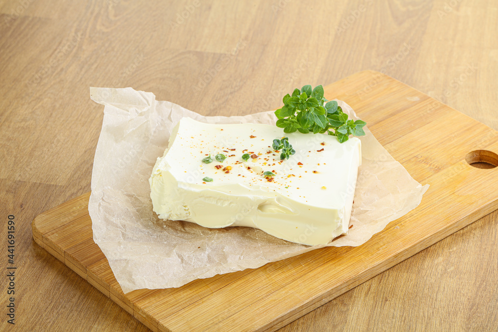 Greek Feta cheese over board