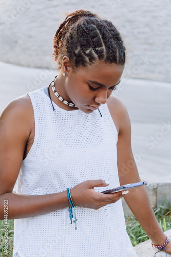 african-american woman using her cell phone, mobile, telephony
