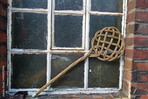 Closeup shot of an old carpet beater
