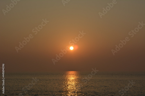 sunset over the sea kuakata