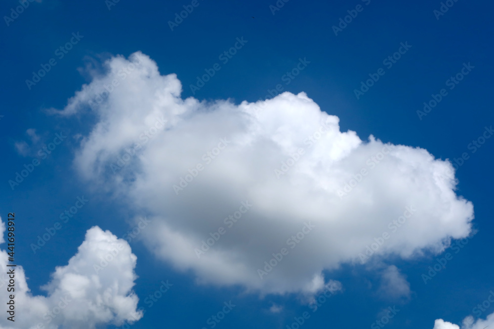 Blue sky with beautiful natural white raining clouds Blue sky with beautiful natural white raining clouds