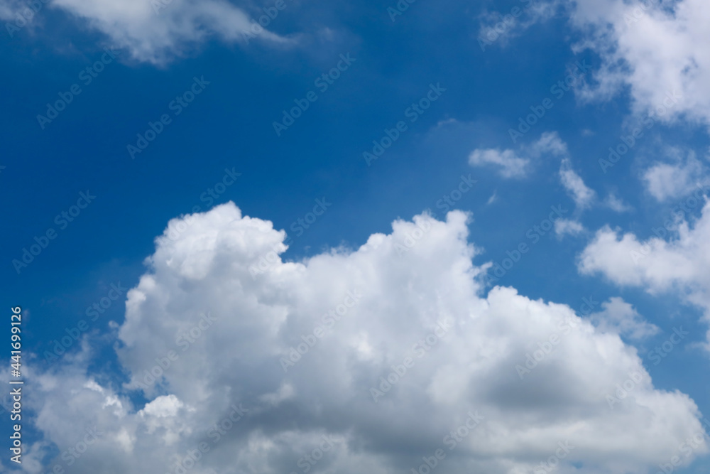 Blue sky with beautiful natural white raining clouds Blue sky with beautiful natural white raining clouds