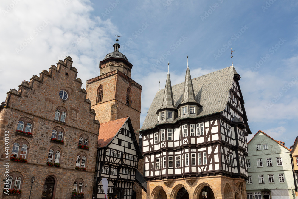 Fototapeta premium famous town hall and half timbered historic houses at central square in Alsfeld, germany.