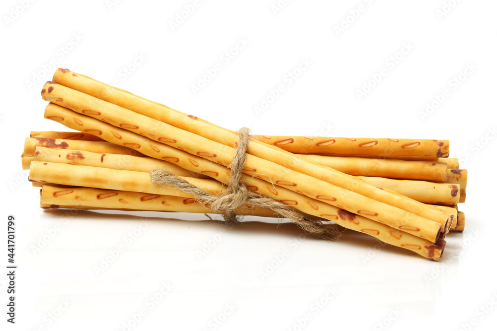 crispy bread straw on white background