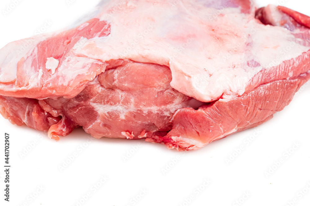 piece of raw pork on a white background. isolated. 