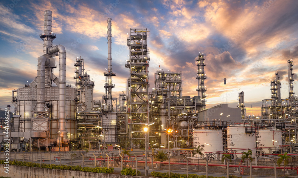 Fototapeta premium Oil and Gas Industrial zone,The equipment of oil refining,Close-up of industrial pipelines of an oil-refinery plant,Detail of oil pipeline with valves in large oil refinery.