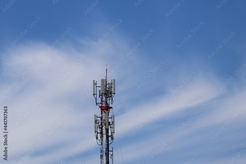 Telecommunications antennas, radio and satellite communication technology, telecommunications industry Mobile network or telecommunications 4g separated from the blue background