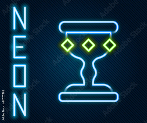 Glowing neon line Medieval goblet icon isolated on black background. Colorful outline concept. Vector