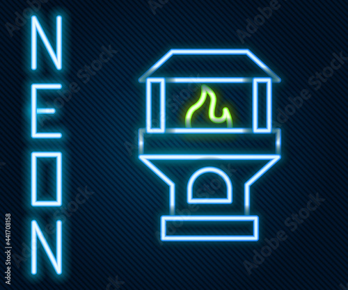 Glowing neon line Brick stove icon isolated on black background. Brick fireplace, masonry stove, stone oven icon.Colorful outline concept. Vector