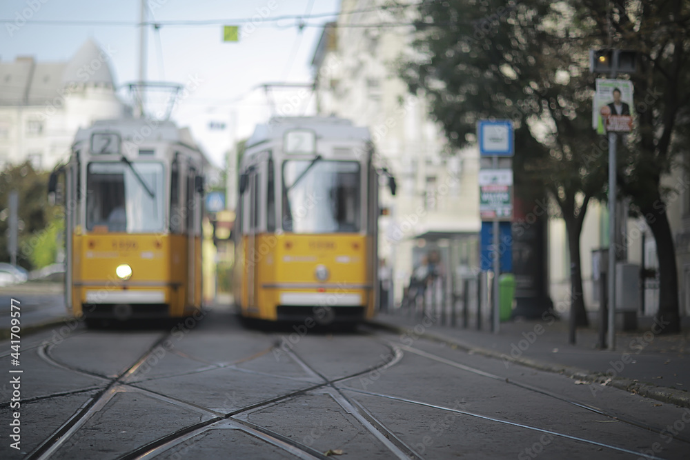 trams city landscape, blurred background traditional european city view, lifestyle