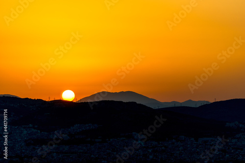 Beautiful sunset colors over the mountains Athens, Greece