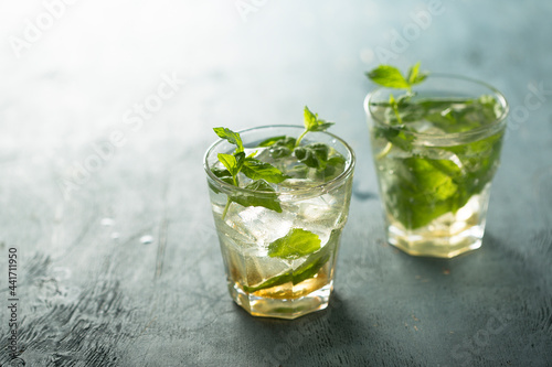 Traditional refreshing Mojito cocktail with fresh mint