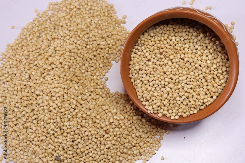 Organic jawar seeds isolated on white background Organic jawar seeds isolated on white background