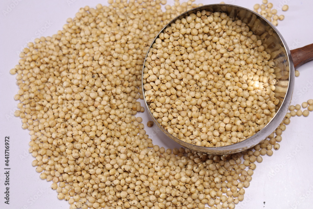 Organic jawar seeds isolated on white background Organic jawar seeds isolated on white background