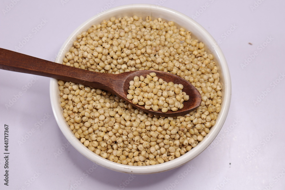 Organic jawar seeds isolated on white background Organic jawar seeds isolated on white background