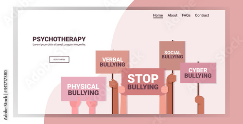 mix race activists hands holding stop bullying banners social anxiety psychotherapy concept