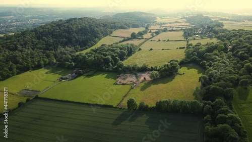 Aerial footage of the British country side fields in the winter time, Surrey country side, surrey hills. Guildford, UK. photo