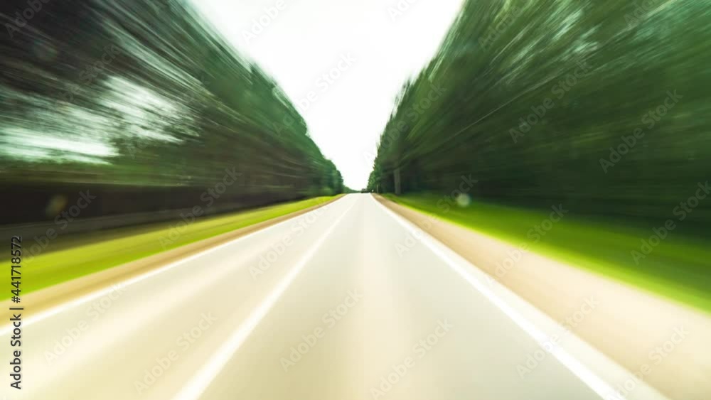 POV High Speed On The Open Road Fast Car Hyperlapse Car Driving on Country Road Through Small Suburbia Road Trip Travel Concept. Freedom on the Road Sort of Dashcam POV High Speed On The Open Road Fast Car Hyperlapse Car Driving on Country Road Through Small Suburbia Road Trip Travel Concept. Freedom on the Road Sort of Dashcam