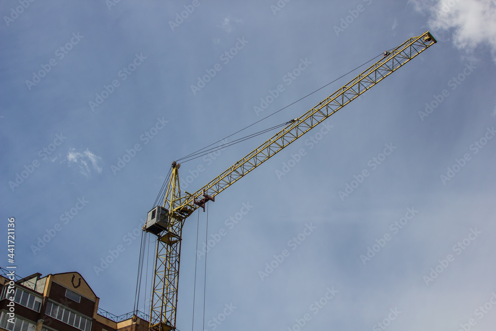 construction crane on sky background at construction site