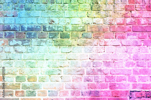 A brick wall in the colors of the rainbow. Concept of LGBT support.