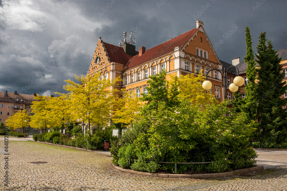 Český Těšín Town Hall against a background of dramatic storm clouds