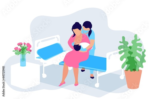 Breastfeeding in the postpartum period in the labor ward. The doula midwife helps to attach the baby to the breast. Mom is sitting on the medical bed. Hospital ward. Breastfeeding support week August