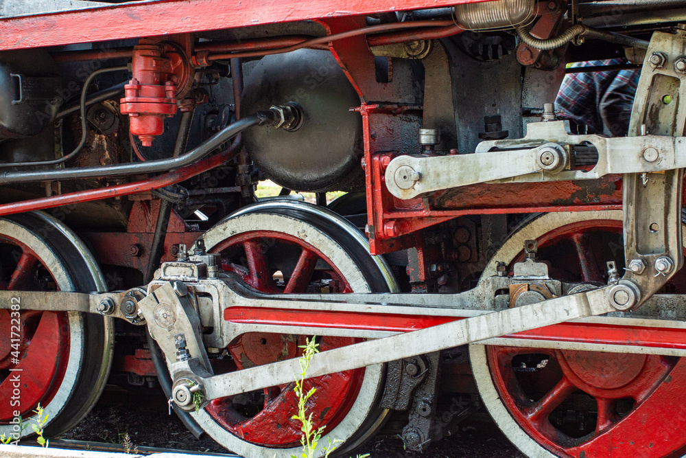 Steam train. View of the wheels and the mechanism.