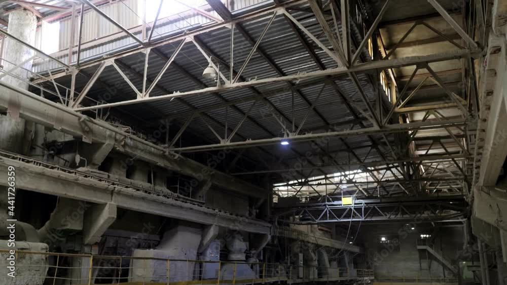 Industrial enterprise for cement processing, the territory of the plant. Interior of the cement plant workshop Industrial enterprise for cement processing, the territory of the plant. Interior of the cement plant workshop