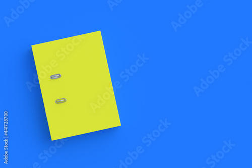 One binder file folder of yellow color on blue background. Top view. Copy space. 3d render