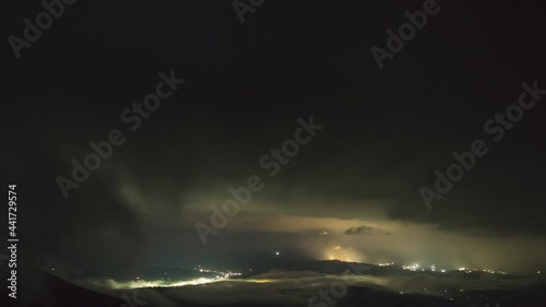 Starry sky, fog, clouds and rain, a village in the Ukrainian carpathians, night landscape, timelapse