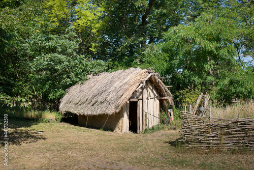 Medieval wooden house. Replica in the nature.