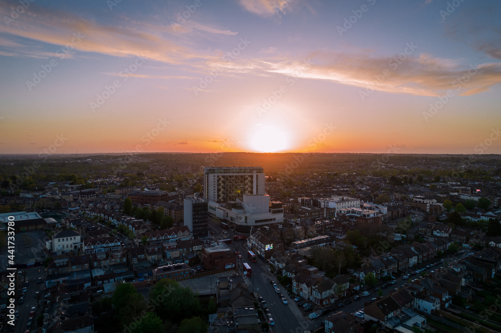 Aerial sunset over tall architecture building 