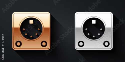 Gold and silver Drum machine icon isolated on black background. Musical equipment. Long shadow style. Vector