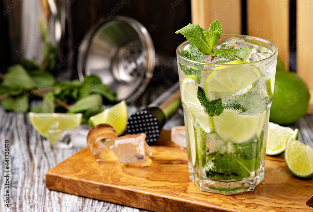 Mojito cocktail with lime, mint and ice Mojito cocktail with lime, mint and ice