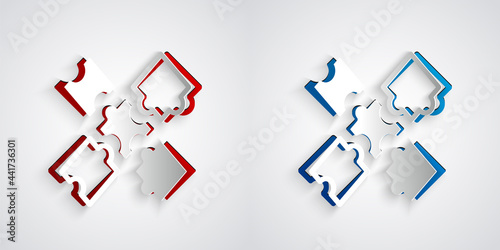 Paper cut Puzzle pieces toy icon isolated on grey background. Paper art style. Vector