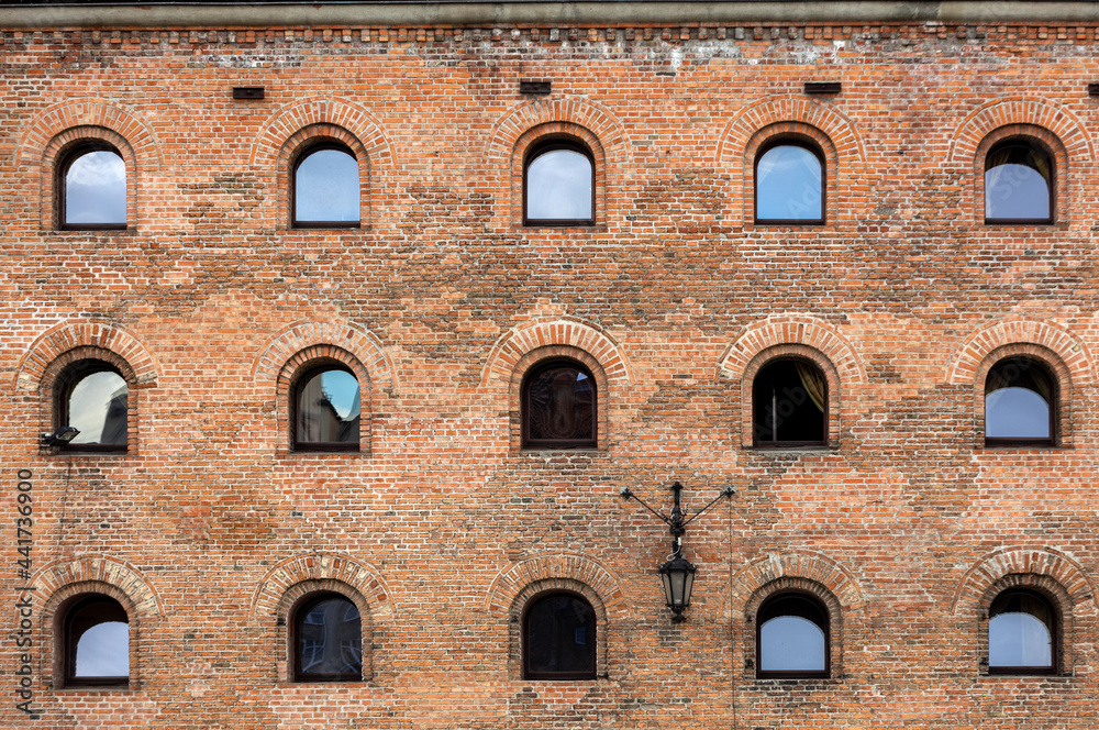 Facade of restored medieval granary on the Olowianka island in the old town of Gdansk