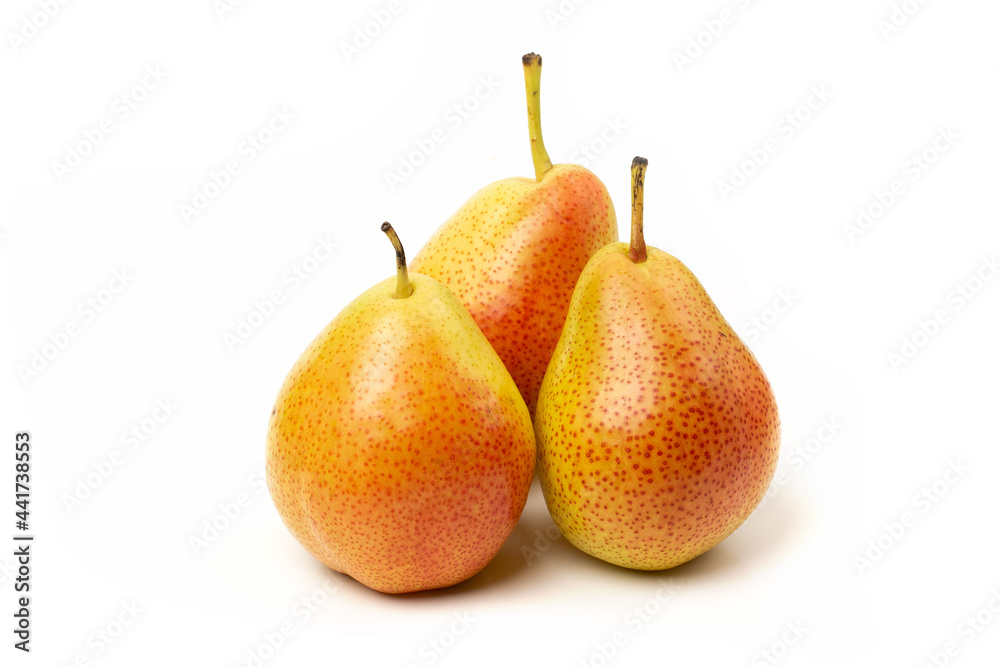Three fresh trout pears are red and yellow isolated on a white background. Three fresh trout pears are red and yellow isolated on a white background.