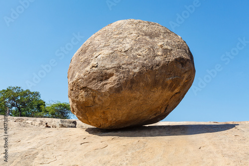 Krishna's Butter Ball, a huge boulder in Mamallapuram, Tamil Nadu, India, Asia photo