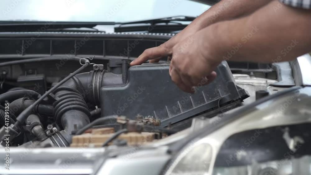 working and repair on car engine . working and repair on car engine .