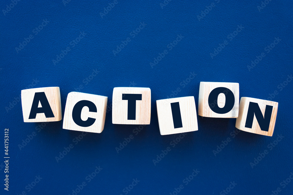 Obraz premium Wooden Blocks with the text: Action. Business and Education concept.