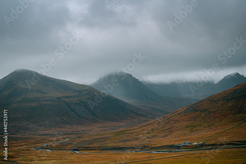 West Fjords or The Westfjords is region in north Iceland. Dramatic moody sky nature landscape