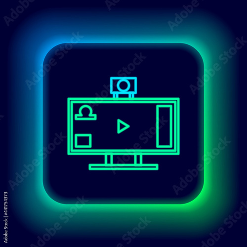 Glowing neon line Live streaming online videogame play icon isolated on black background. Colorful outline concept. Vector